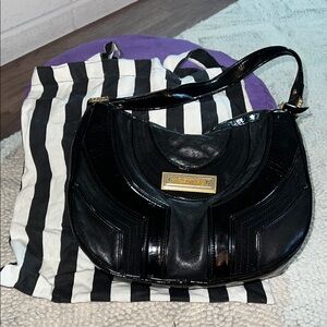 Black Crescent Shoulder Bag with Gold Clasp